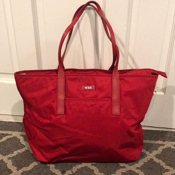 Tumi Handbags - Tumi Red Nylon Shoulder Travel Bag